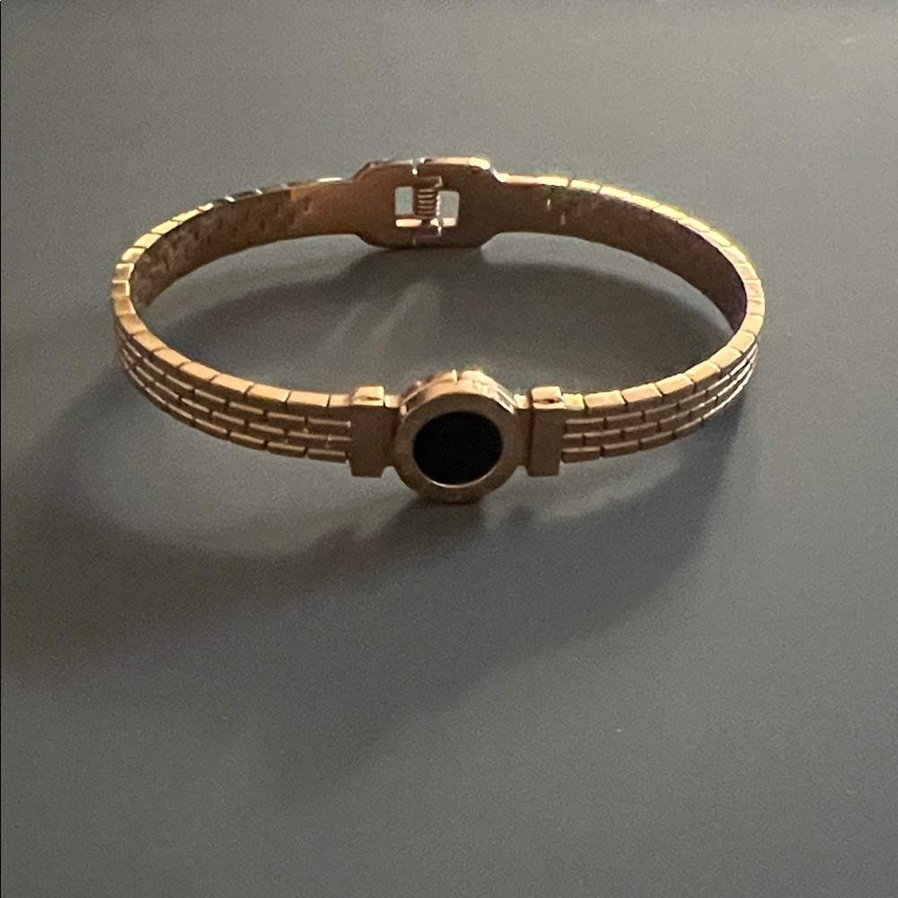 Gold Bracelet with Black Centerpiece